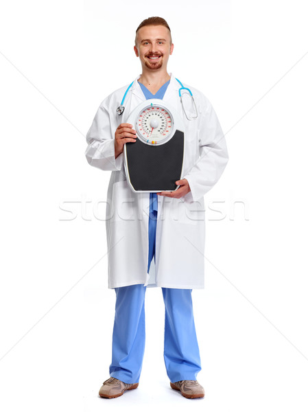 врач диетолог Весы изолированный белый медицинской Сток-фото © Kurhan