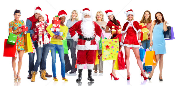 Group of happy Christmas people with gifts. Stock photo © Kurhan