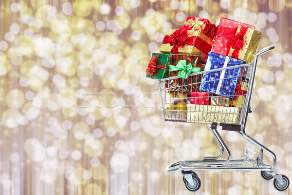 Shopping cart  with gifts. Stock photo © Kurhan