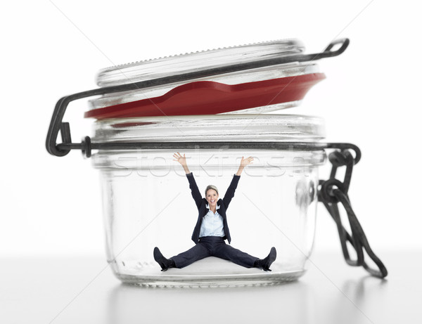 Business woman in jar. Stock photo © Kurhan