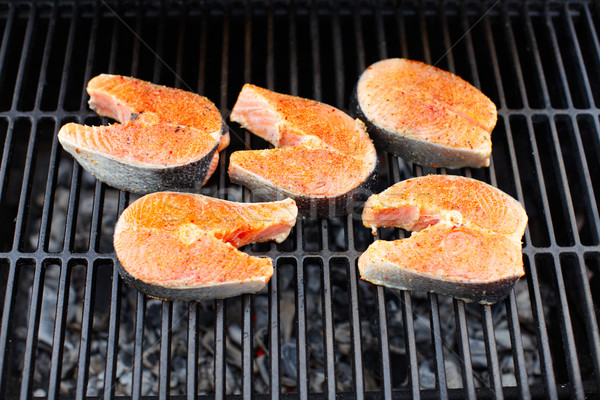 Salmon fish roasted on barbecue grill. Stock photo © Kurhan