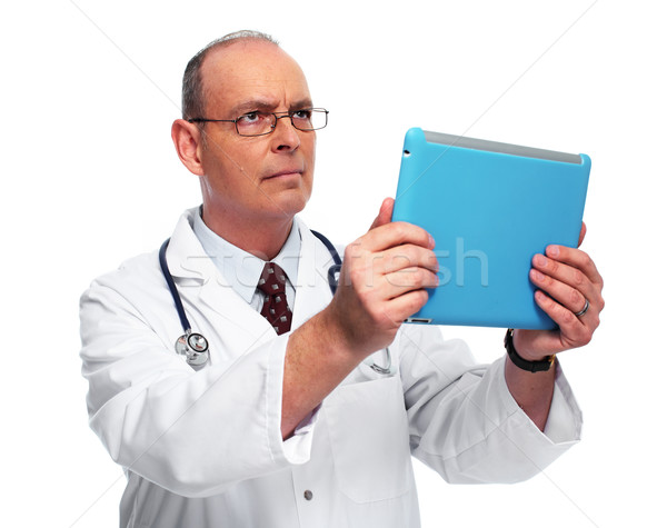 Mature medical doctor man with tablet computer. Stock photo © Kurhan