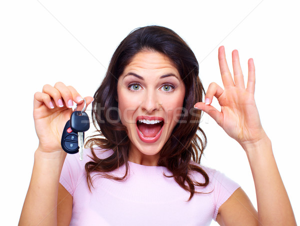 Femeie cheile de la masina izolat alb afaceri fată Imagine de stoc © Kurhan