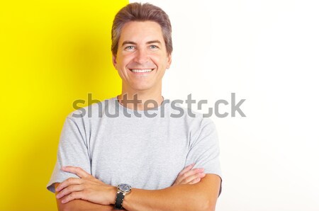 Rendbehoz mosolyog jóképű férfi festett belső fal Stock fotó © Kurhan