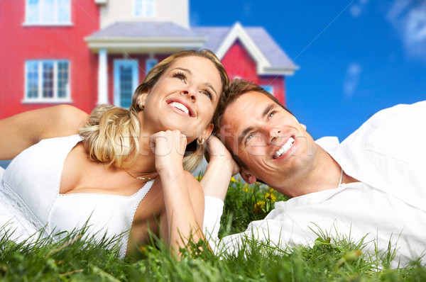 Szeretet pár fiatal mosolyog álmodik új otthon Stock fotó © Kurhan
