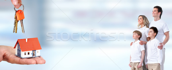 Happy family and little house. Stock photo © Kurhan
