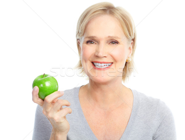 Kobieta jabłko dojrzały uśmiechnięta kobieta zielone żywności Zdjęcia stock © Kurhan