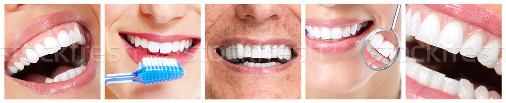 Teeth with toothbrush. Stock photo © Kurhan