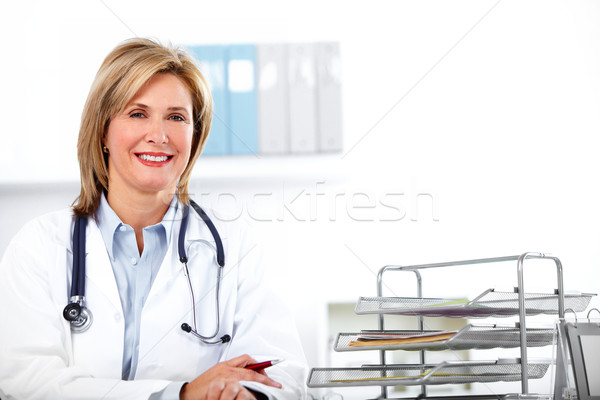 Stock photo: Mature doctor woman in a clinical office.