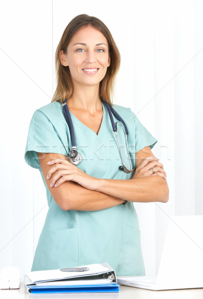 Enfermera sonriendo médicos portátil blanco médico Foto stock © Kurhan