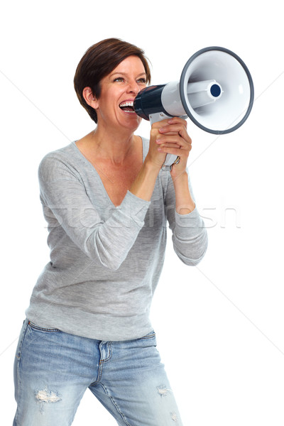 Happy woman talking in megaphone. Stock photo © Kurhan