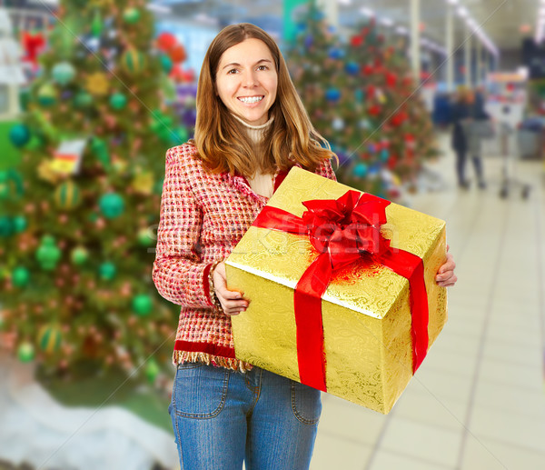 Happy Christmas girl with gift. Stock photo © Kurhan