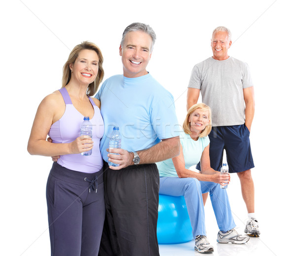 Siłowni fitness uśmiechnięty ludzi biały Zdjęcia stock © Kurhan