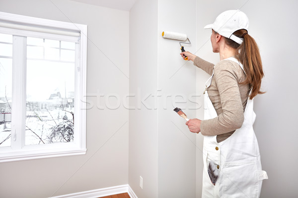 Woman painting wall Stock photo © Kurhan