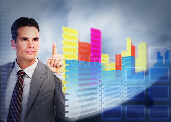 Businessman touching a holographic screen. Stock photo © Kurhan