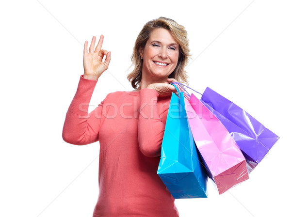 Senior woman with shopping bags. Stock photo © Kurhan