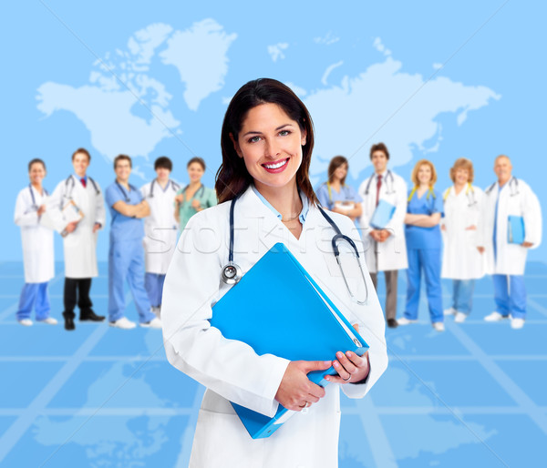 Doctor woman with a medical team. Health care. Stock photo © Kurhan