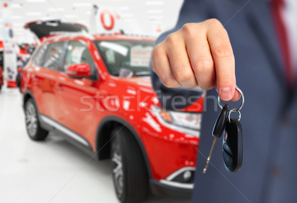 Car dealer hand with a key. Stock photo © Kurhan