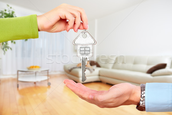 Hand with house key. Stock photo © Kurhan