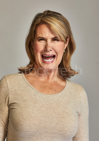 Obrzydzenie starszy kobieta emocjonalny portret ludzi Zdjęcia stock © Kurhan