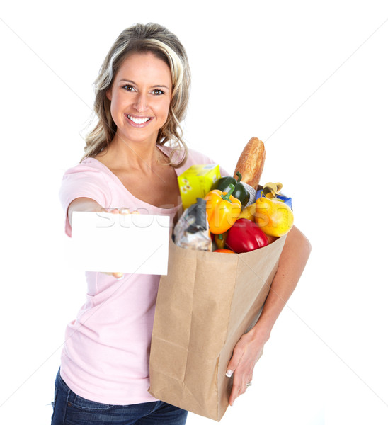 Stock photo: Beautiful woman with grocery bag.