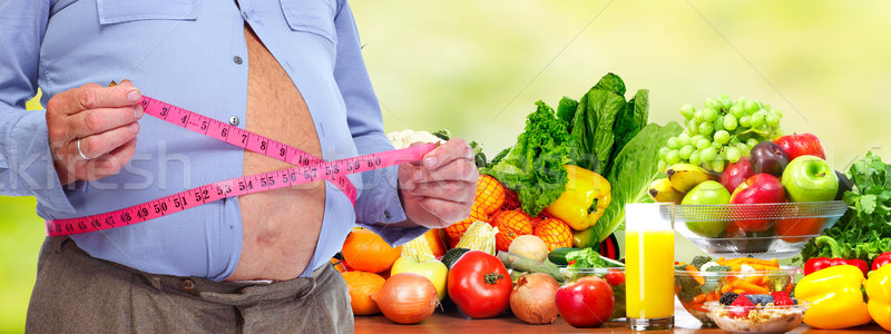 Zwaarlijvig man buik meetlint zwaarlijvigheid Stockfoto © Kurhan