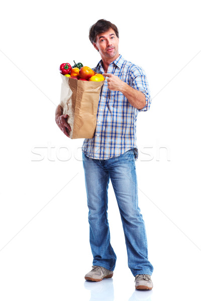 Lebensmittelgeschäft schöner Mann Tasche isoliert weiß Papier Stock foto © Kurhan