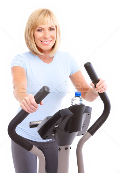 Gymnase fitness souriant isolé [[stock_photo]] © Kurhan