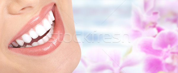 Beautiful woman smile. Stock photo © Kurhan