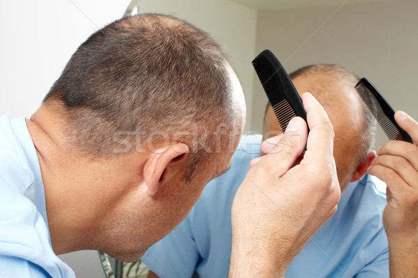 Man head with a comb. Stock photo © Kurhan
