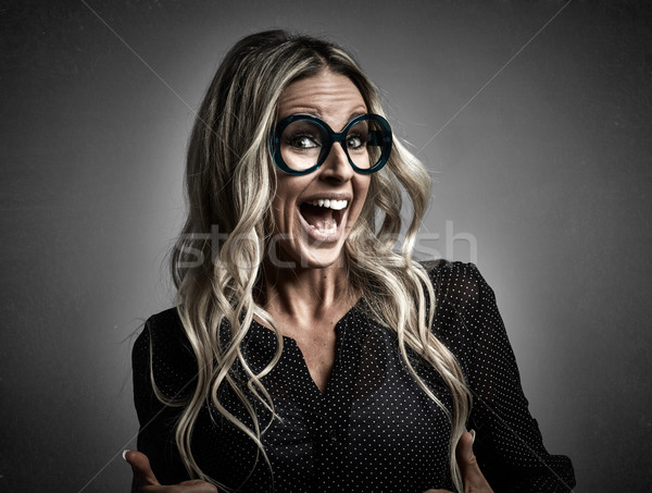 Stock photo: Young happy laughing girl portrait.