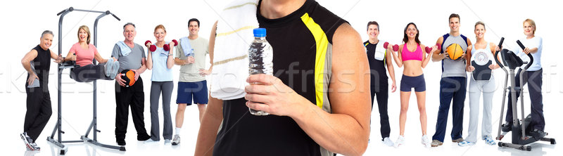 Young fitness man with bottle of water. Stock photo © Kurhan