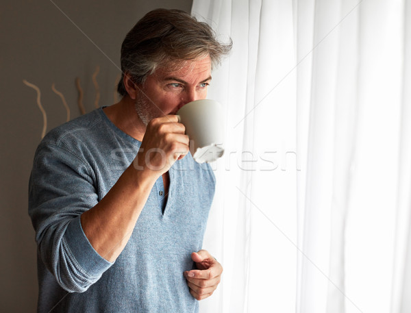 Przystojny mężczyzna kubek herbaty okno człowiek Zdjęcia stock © Kurhan
