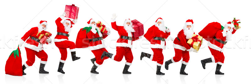 Happy running Christmas Santas Stock photo © Kurhan