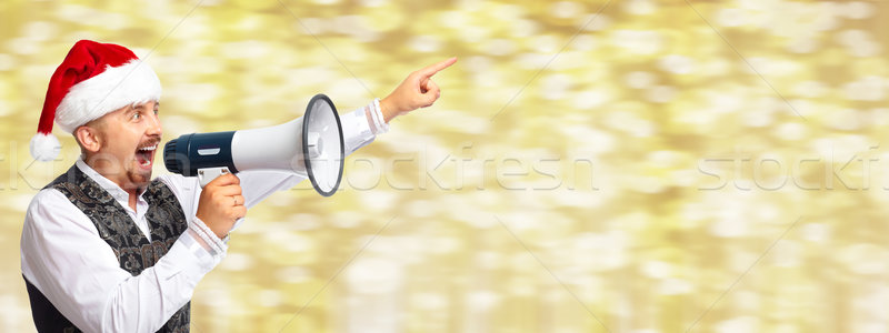 Stock photo: Santa man with megaphone.