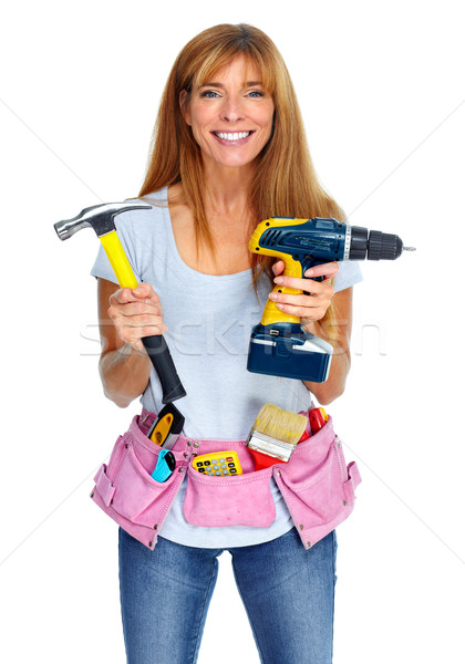 Woman with drill and hammer. Stock photo © Kurhan