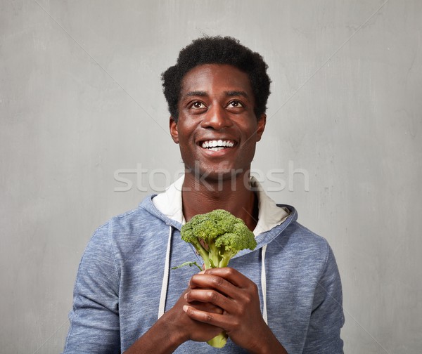 Black man with broccoli Stock photo © Kurhan