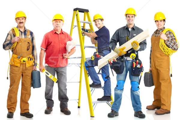 Industrial trabalhadores grupo amarelo capacete isolado Foto stock © Kurhan