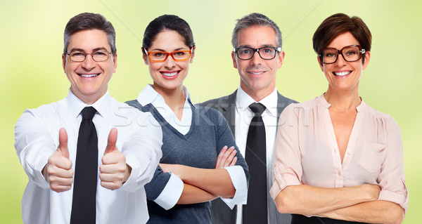 Group of business people wearing eyeglasses. Stock photo © Kurhan