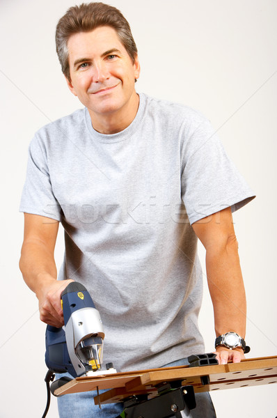 Bonito sorridente homem trabalhando casa Foto stock © Kurhan