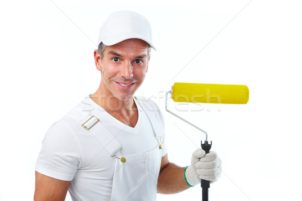 Painter man with painting roller. Stock photo © Kurhan