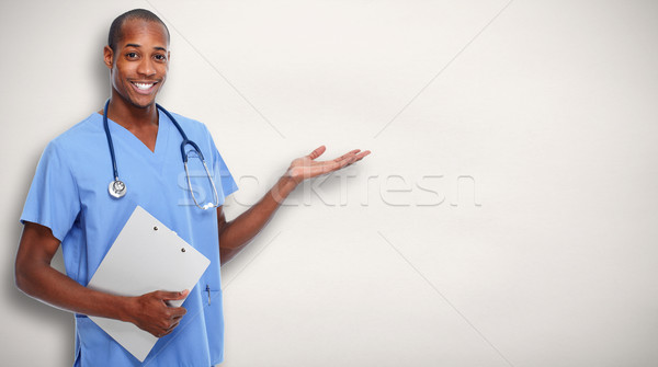 Medical doctor man presenting copy space. Stock photo © Kurhan