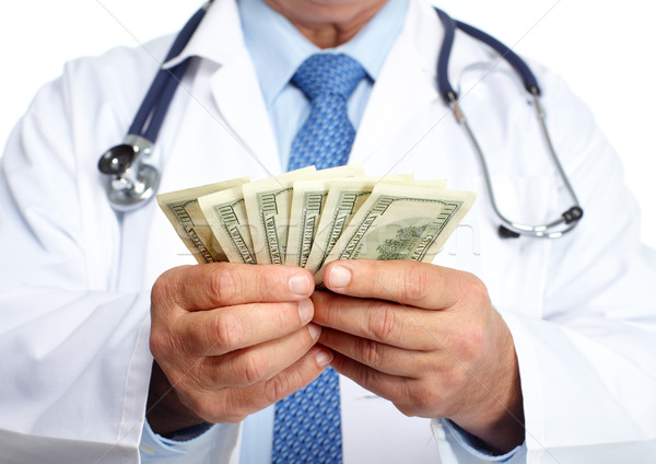 Kezek orvosi orvos pénz egészségügy kék Stock fotó © Kurhan
