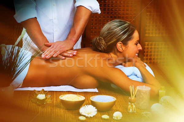 Beautiful woman having massage. Stock photo © Kurhan