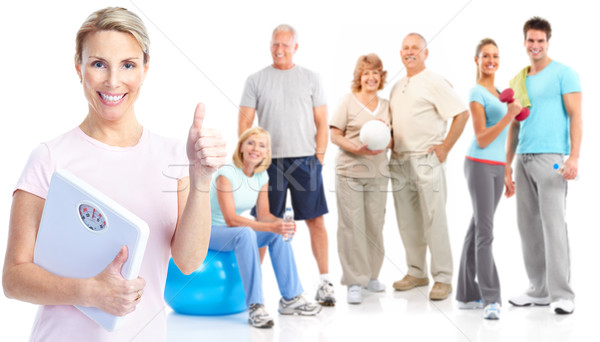 Tornaterem fitnessz egészséges életmód mosolyog emberek fehér Stock fotó © Kurhan