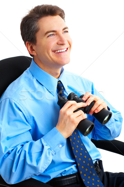 Hombre de negocios binoculares mirando oficina empresario gafas Foto stock © Kurhan