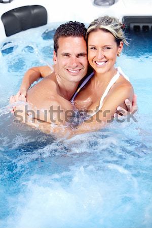 情侶 按摩浴池 年輕 愛 放寬 自在 商業照片 © Kurhan