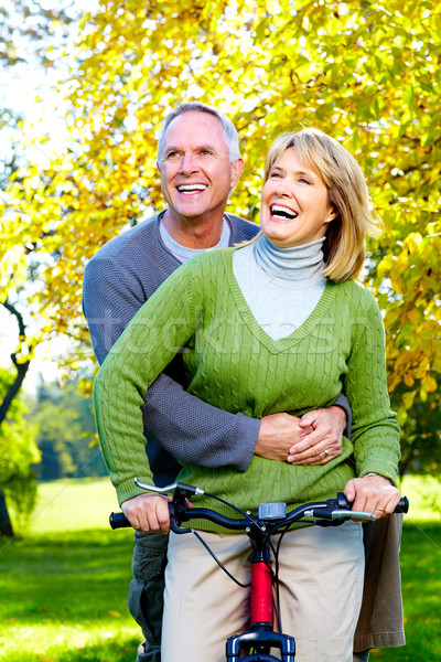 Casal de idosos feliz bicicleta parque mulher família Foto stock © Kurhan