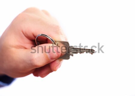 Hand with a house key. Stock photo © Kurhan