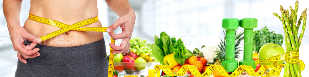 Frau Abdomen Maßband Gemüse Gewichtsverlust Diäten Stock foto © Kurhan